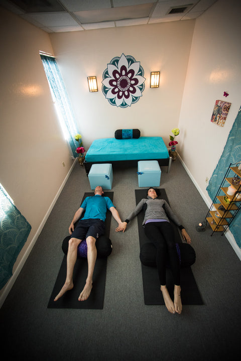 Couples connect in yoga